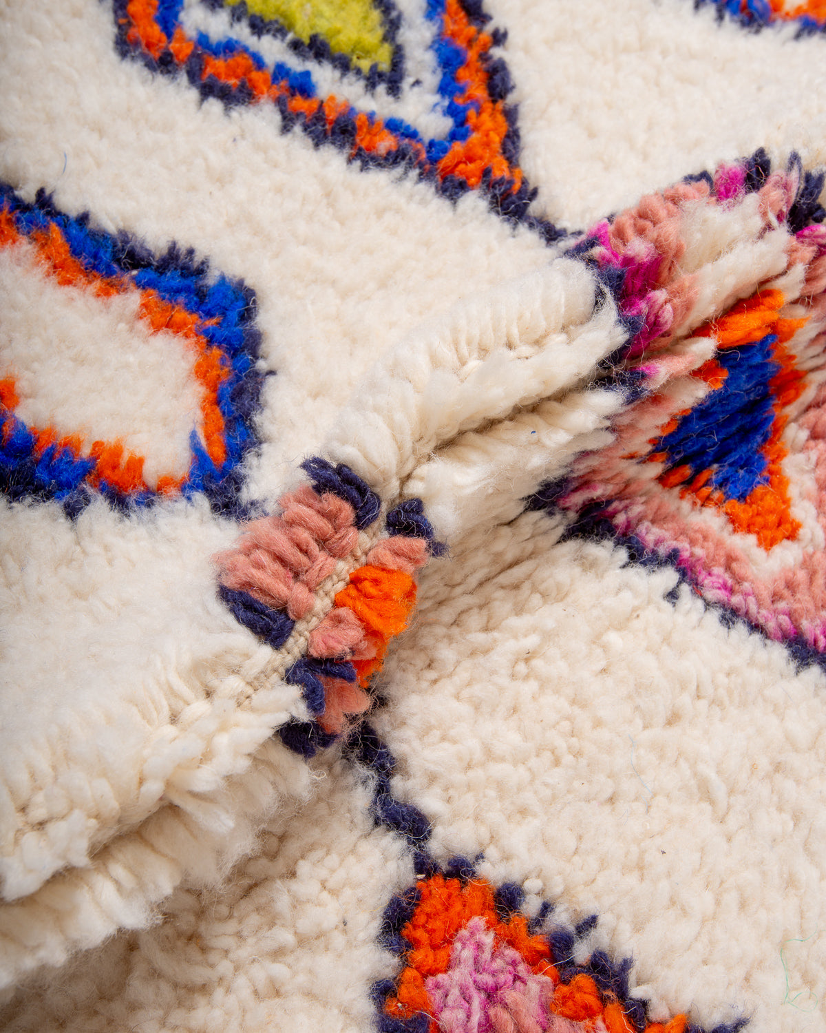 Modern, designer, handcrafted Berber rug from Morocco. Beniourain carpet with beautiful colours and patterns and fluffy wool texture.
